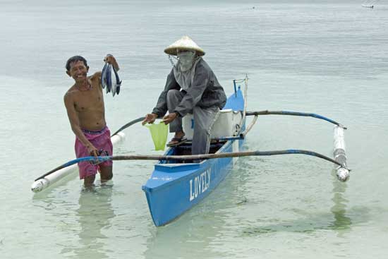 fishermen with fish-AsiaPhotoStock